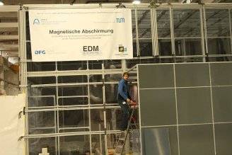 The experiment for the measurement of the electric dipole moment of the neutron currently under construction at the neutron guide hall east at the Research Neutron Source Heinz Maier-Leibnitz (FRM II). (©Riedel/TUM)