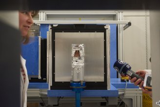 Dr. Malgorzata Makowska in front of one of the mounted eggs inside the instrument NECTAR