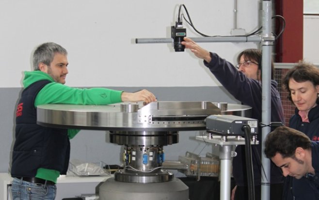 Cameras being calibrated for testing of the ESS target wheel prototype at the ESS-Bilbao research and development facility in Zamudio, Spain. From left, Gorka Bakedano, Javier Corres, idoia Mazquiarán, and Carlos Cruz. Photo: ESS-Bilbao