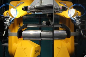 A roboter holds and turns the aluminum sample in the neutron beam at STRESS-SPEC. Credit: Joana Rebelo Kornmeier